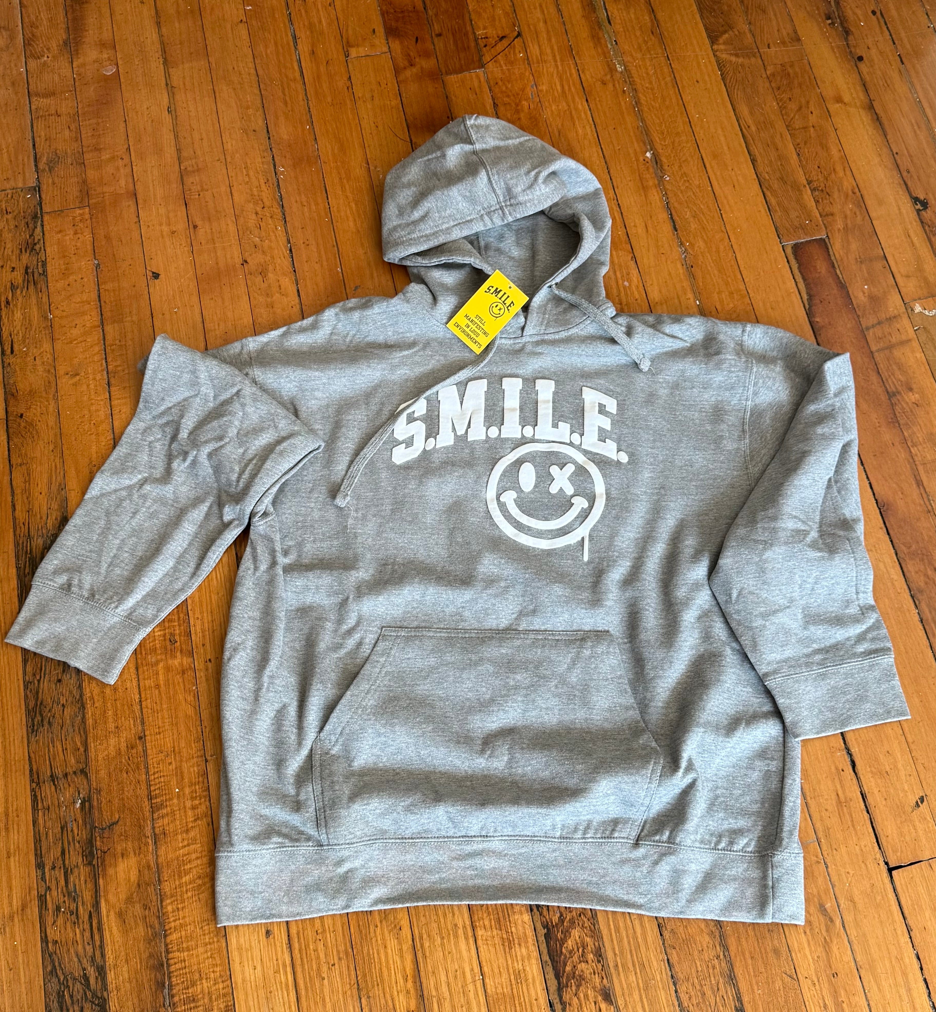 The OG Essential Hoodie – S.M.I.L.E.